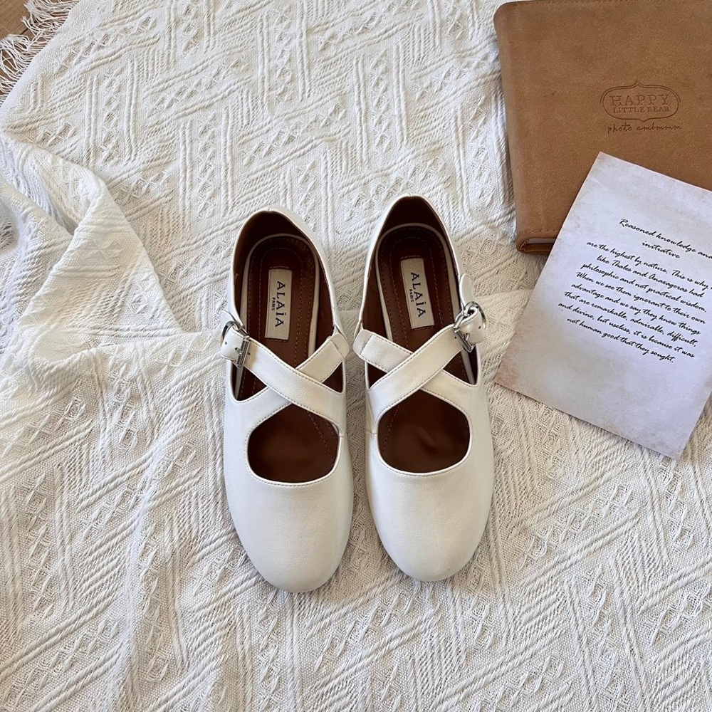 Alaia Cream Cross-Strap Flats